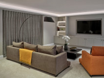 Closed curtains in TV room