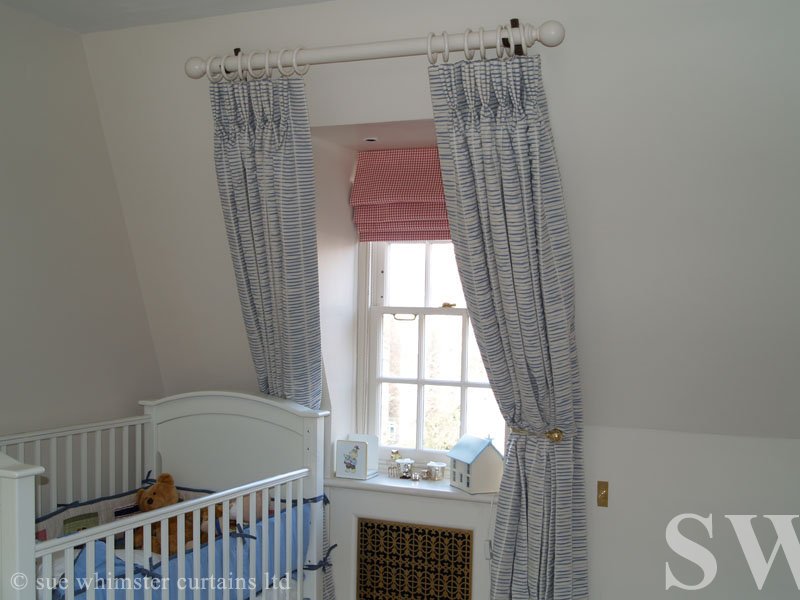 curtains fitted to slope ceiling