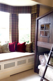Bay window curtains with window seat with cushions