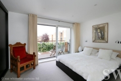 bedroom eyelet curtains from silver satin pole