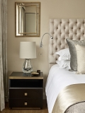 Headboard with cushions and bedthrow