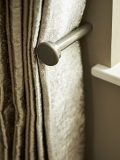 Curtain hold backs