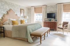 Curtains in bedroom with Roman blinds behind