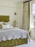 headboard and curtains in bedroom