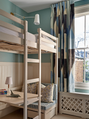 Triple pleat curtains in bunk bed room