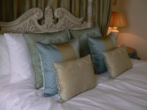 cushions on bed