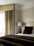 cushion on bed, with curtains