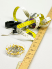 measuring tape ruler and pins